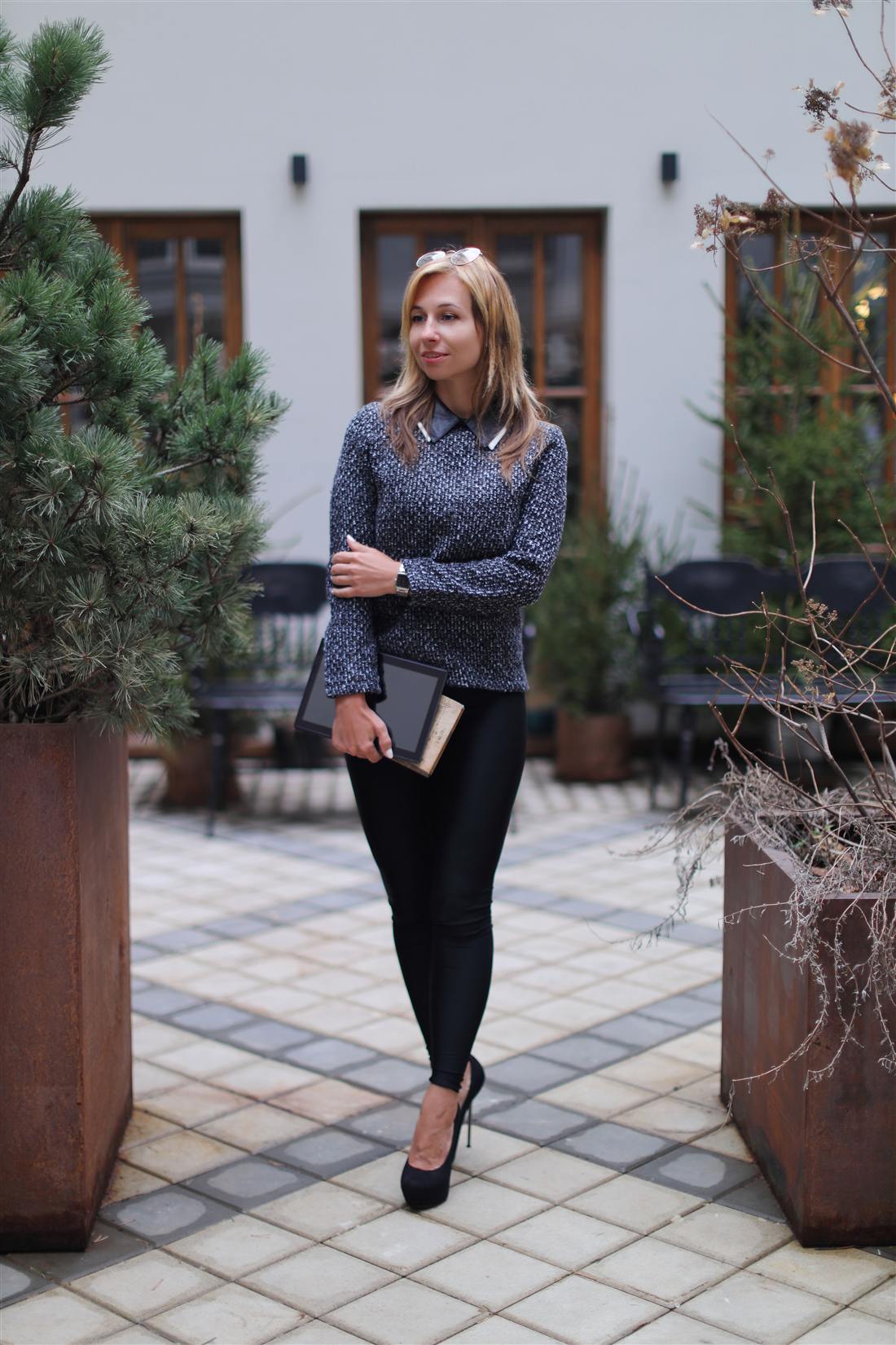 A student with her notebook on campus