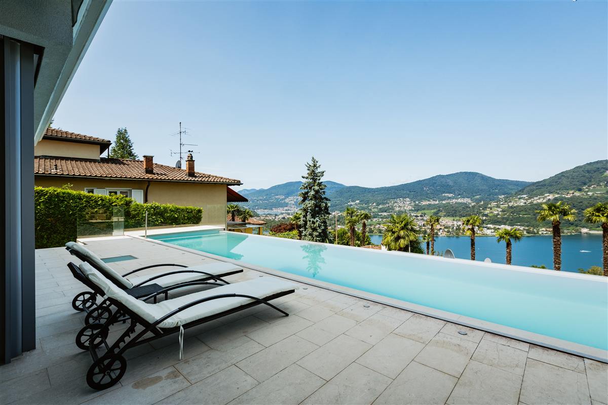 A private terrace overlooking the water at a luxury property